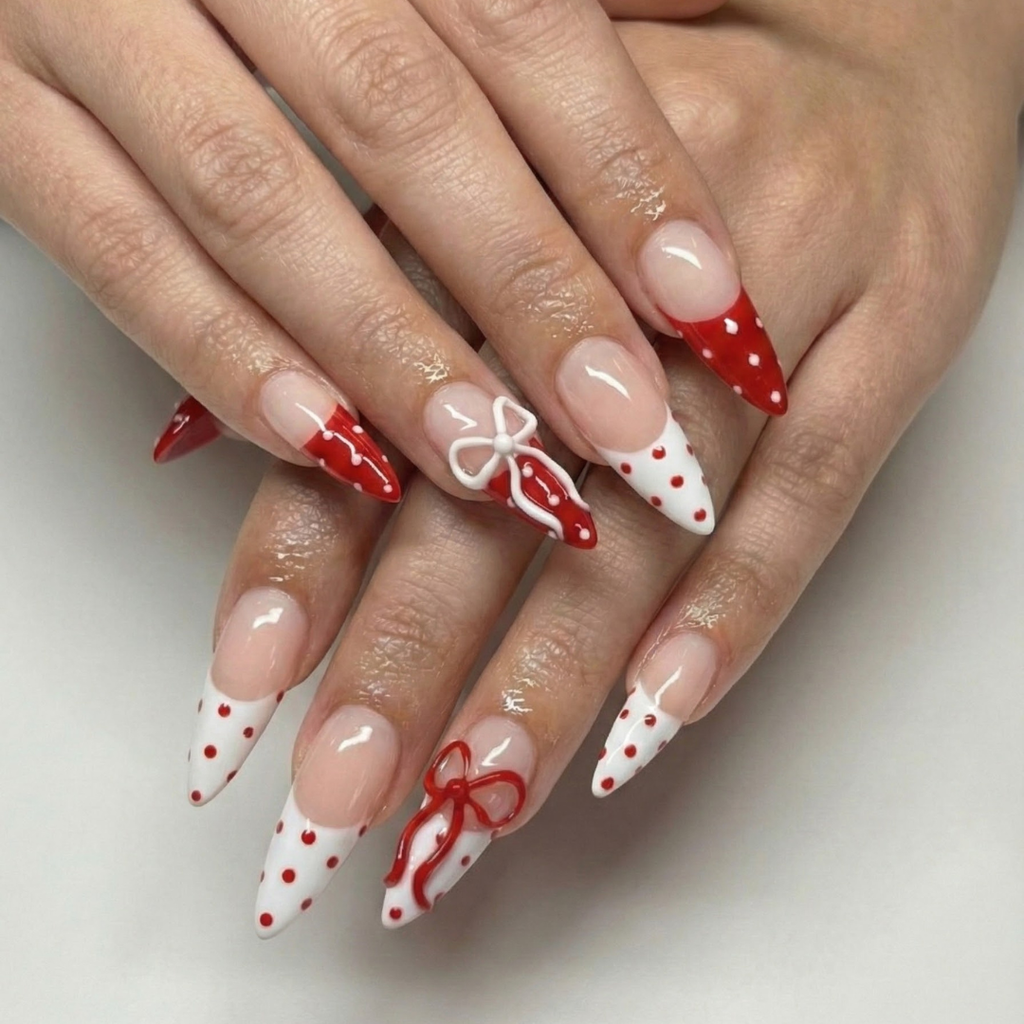 Press On Nails Adhesive Tabs with Red & White Polka Dot French Tip and 3D Bow Design. Handmade Long Stiletto Fake Nails for Valentine Look or Coquette Aesthetic Nails | OB7L